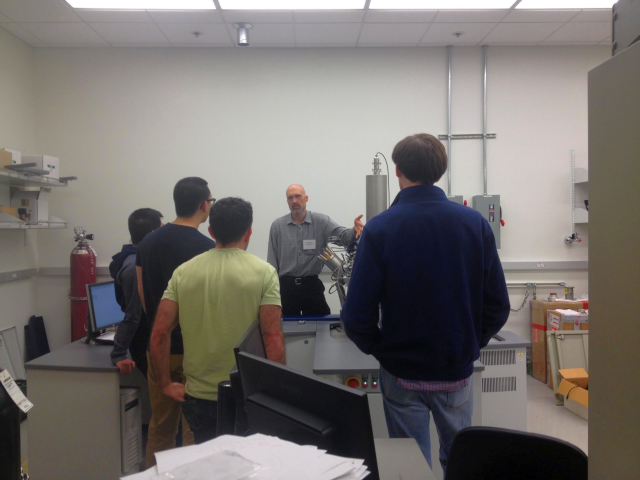 A man showing an audience how to use a tool in the MAF.
