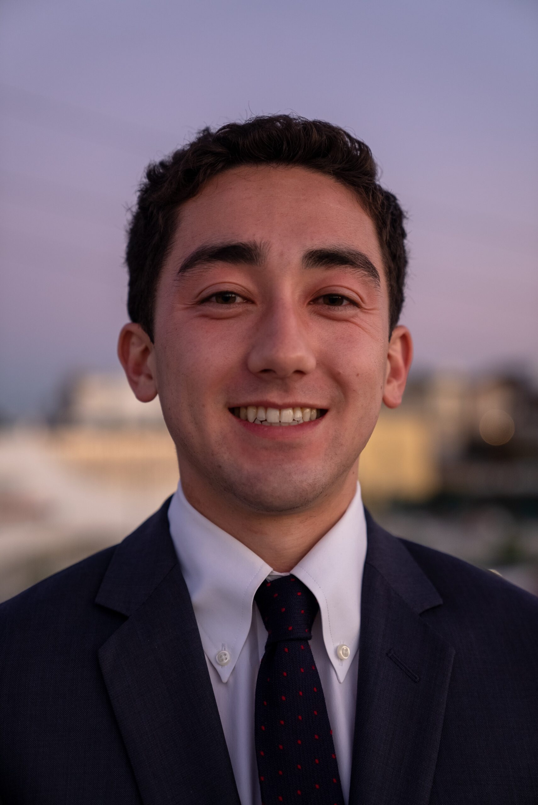 Headshot of a smiling Alexander Shida